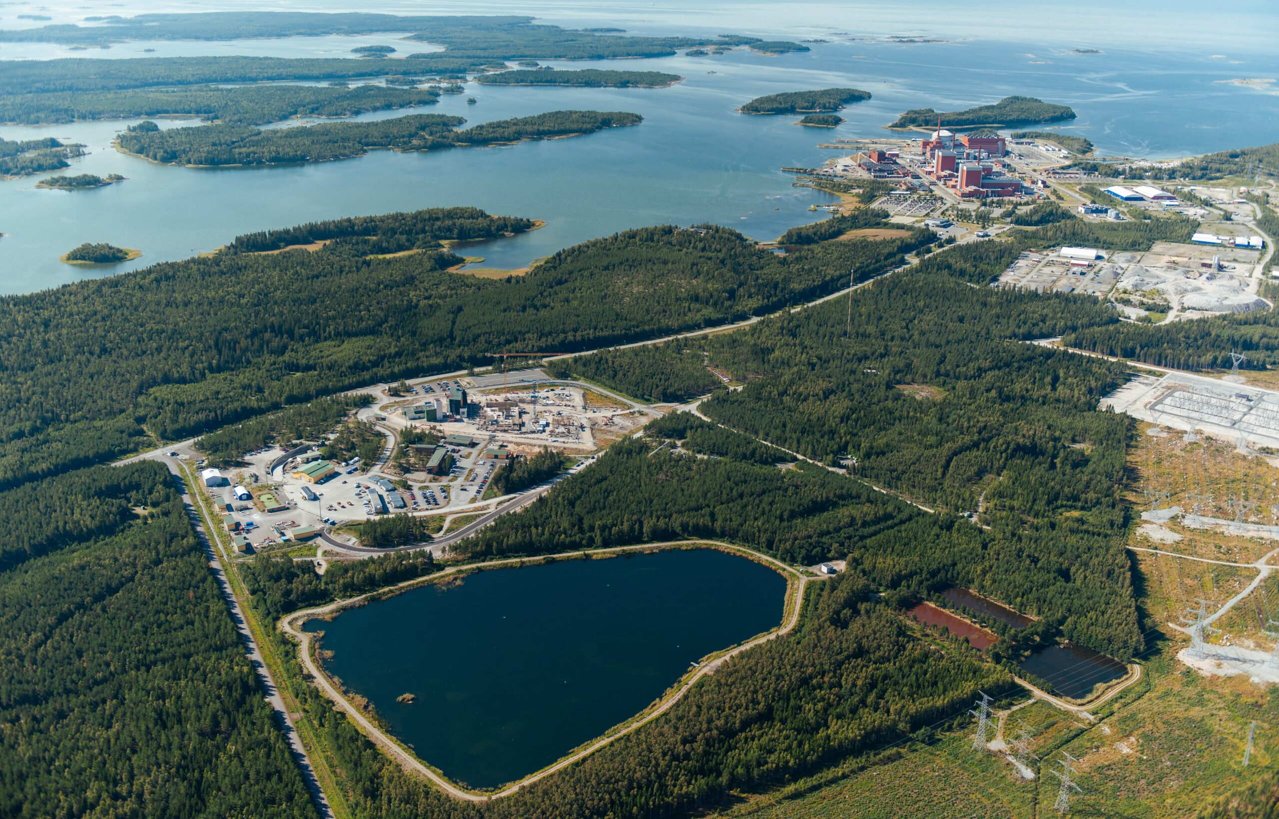 The facility is on Olkiluoto Island, among the area’s pine forests and wildlife